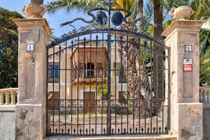 House facade, lattice gate, palm trees, house view, architecture, Santiago de Ribera, Mar Menor, autonomous region of Murcia, Spain,
