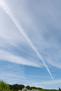 Germany, Mecklenburg-Western Pomerania, Usedom Island, blue sky, clouds, contrails Germany, Mecklenburg-Western Pomerania, Usedom Island, blue sky, clouds, contrails