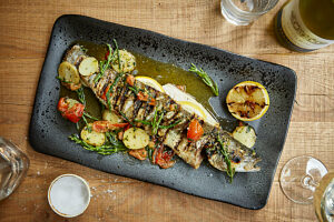 Whole fish with roasted vegetables and samphire