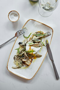 Grilled bread with mushrooms and poached egg