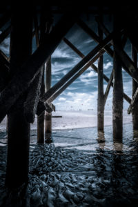 Germany, Schleswig-Holstein, Sankt Peter-Ording, beach, pole, buildings on stilts Germany, Schleswig-Holstein, Sankt Peter-Ording, beach, pole, buildings on stilts