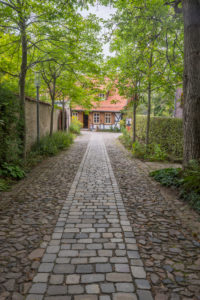 Germany, Saxony-Anhalt, Ilsenburg, entrance to the monastery Drübeck with a view to the gardener's house Germany, Saxony-Anhalt, Ilsenburg, entrance to the monastery Drübeck with a view to the gardener's house