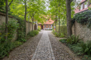 Germany, Saxony-Anhalt, Ilsenburg, entrance to the monastery Drübeck with a view to the gardener's house Germany, Saxony-Anhalt, Ilsenburg, entrance to the monastery Drübeck with a view to the gardener's house