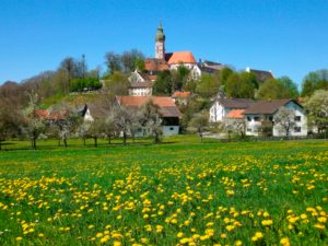 Germany, Upper Bavaria, Andechs, residential buildings and monastery church in spring Germany, Upper Bavaria, Andechs, residential buildings and monastery church in spring