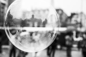The Netherlands, Holland, Amsterdam, Dam, bursting bubble with reflexion The Netherlands, Holland, Amsterdam, Dam, bursting bubble with reflexion