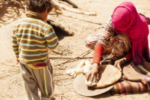 Boy with mother of a nomad family, Sahara Boy with mother of a nomad family, Sahara