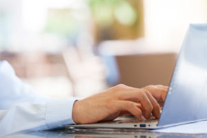 Businessman using laptop computer