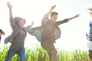 Young people leaping with exuberance