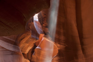 Beam of sunlight shining into Antelope Canyon, Arizona, USA