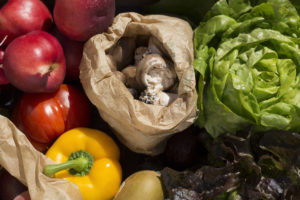 crate filled with fruits and vegetables