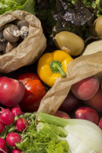 crate filled with fruits and vegetables