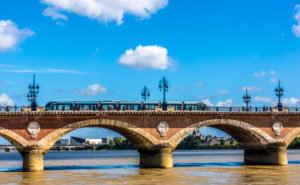 France, New Aquitaine, Bordeaux, stone bridge and tram (UNESCO World Heritage)