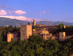 Spain, Andalousia, Granada, overall view of Alhambra palace, mountains at the back