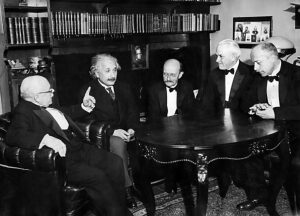 German and American physicists and chemists (left to right): Walther Nernst, Albert Einstein, Max Planck, Robert Andrews Millikan, and Max von Laue, at a dinner given by Max von Laue on 12 November 1931 in Berlin.