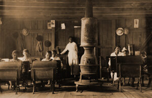 School for black children in Anthoston, Kentucky. Only 7 of 27 children in the area regularly attended school: "Tobacco keeps them out and they are short of hands." Henderson County, Kentucky. Photographed by Lewis W. Hine (1874-1940),