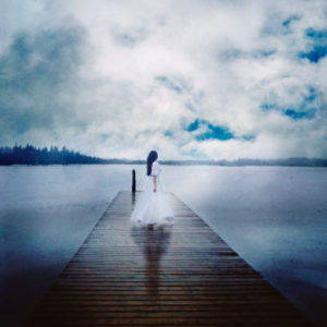 Bildagentur Mauritius Images Woman In White Dress Stands Lonely On A Jetty By The Lake