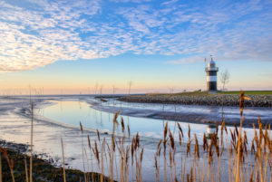 The lighthouse Little Prussia near Wremen in the region Wurster North Sea coast The lighthouse Little Prussia near Wremen in the region Wurster North Sea coast