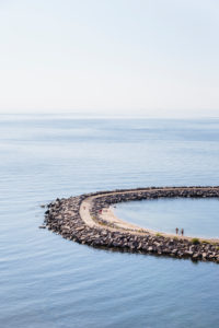 Bathers at the pier of Vang, former port of debarkation of the granite quarry, Europe, Denmark, Bornholm, Bathers at the pier of Vang, former port of debarkation of the granite quarry, Europe, Denmark, Bornholm,
