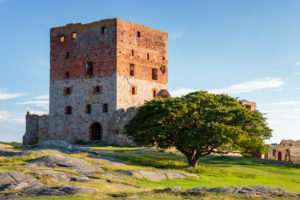 The huge residential tower of the Hammershus castle ruin (13th century) in the evening light, Europe, Denmark The huge residential tower of the Hammershus castle ruin (13th century) in the evening light, Europe, Denmark
