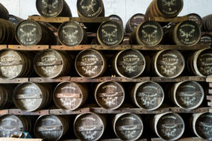 Habitation la Favorite, rum distillery, wooden barrels, distillation with steam engine same as 100 years ago Habitation la Favorite, rum distillery, wooden barrels, distillation with steam engine same as 100 years ago