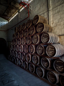 Habitation la Favorite, rum distillery, barrels, distillation with steam engine same as 100 years ago Habitation la Favorite, rum distillery, barrels, distillation with steam engine same as 100 years ago