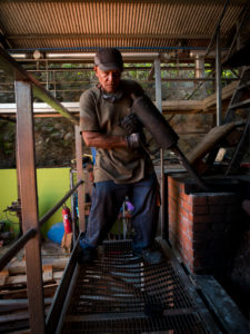 Neisson Rhum, rum distillery by steam engine, coal slot Neisson Rhum, rum distillery by steam engine, coal slot