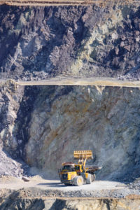 Eisenerz, mountain Erzberg of iron ore mine, mine vehicules, truck, wheel loader in Hochsteiermark, Steiermark, Styria, Austria Eisenerz, mountain Erzberg of iron ore mine, mine vehicules, truck, wheel loader in Hochsteiermark, Steiermark, Styria, Austria
