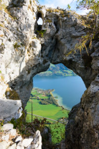 Mondsee, lake Mondsee, rock hole Drachenloch in Salzkammergut area, Salzburg, Austria Mondsee, lake Mondsee, rock hole Drachenloch in Salzkammergut area, Salzburg, Austria