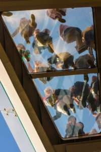 Kiev (Kyiv), glass floor Klitschko Pedestrian-Bicycle Bridge, people photographed from underneath in Kyiv, Ukraine Kiev (Kyiv), glass floor Klitschko Pedestrian-Bicycle Bridge, people photographed from underneath in Kyiv, Ukraine