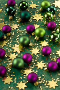 Green and purple Christmas balls, scattering stars, Green and purple Christmas balls, scattering stars,