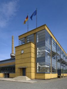 Bildagentur | mauritius images | Low angle view of Fagus Factory against  clear blue sky in city, Lower Saxony, Germany