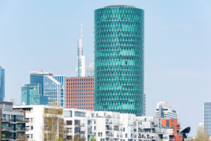 Germany, Hessen, Frankfurt, row of houses at Speicherstraße, with the Westhafen Tower. Germany, Hessen, Frankfurt, row of houses at Speicherstraße, with the Westhafen Tower.