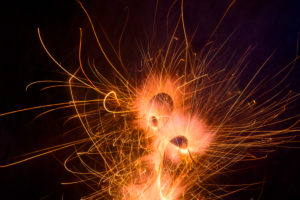 New Year's Eve, fireworks, fire spinning top spins on the floor. New Year's Eve, fireworks, fire spinning top spins on the floor.