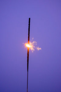 Burning sparkler. Burning sparkler.