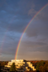 Germany, Baden-Wuerttemberg, Karlsruhe, rainbow over a residential complex. Germany, Baden-Wuerttemberg, Karlsruhe, rainbow over a residential complex.