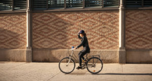 Young woman by bicycle in Barcelona, Catalonia, Spain Young woman by bicycle in Barcelona, Catalonia, Spain