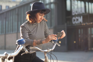 Young woman by bicycle in Barcelona, Catalonia, Spain Young woman by bicycle in Barcelona, Catalonia, Spain