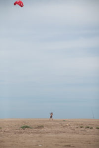 Spain, Ebro Delta, beach, man with sport kite Spain, Ebro Delta, beach, man with sport kite