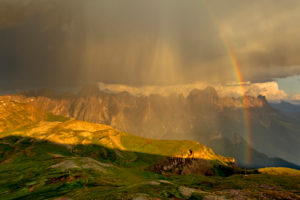 Italy, region Trentino South Tirol, province Bolzano, the Dolomites, Schlern, thunderstorm and rainbow above the rose garden massif Italy, region Trentino South Tirol, province Bolzano, the Dolomites, Schlern, thunderstorm and rainbow above the rose garden massif