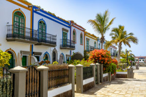 Restored colorful houses in popular port town of Puerto de Mogan, southwest Gran Canaria, Spain Restored colorful houses in popular port town of Puerto de Mogan, southwest Gran Canaria, Spain