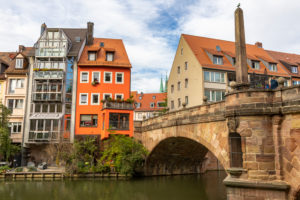 View of Charles Bridge and houses on the Pegnitz River in the afternoon, Nuremberg city center, Franconia, Bavaria, Germany View of Charles Bridge and houses on the Pegnitz River in the afternoon, Nuremberg city center, Franconia, Bavaria, Germany