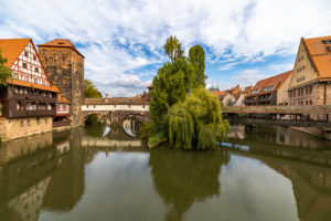 View from Maxbrücke to the Pegnitz (river) and the Henkerbrücke + Henkersteg in the afternoon, Nuremberg city center, Franconia, Bavaria, Germany View from Maxbrücke to the Pegnitz (river) and the Henkerbrücke + Henkersteg in the afternoon, Nuremberg city center, Franconia, Bavaria, Germany