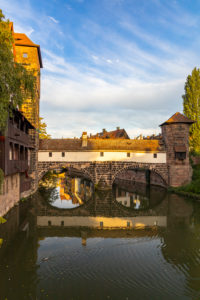 View from Maxbrücke to the Pegnitz (river) and the Henker's Bridge in the evening light, Nuremberg city center, Franconia, Bavaria, Germany View from Maxbrücke to the Pegnitz (river) and the Henker's Bridge in the evening light, Nuremberg city center, Franconia, Bavaria, Germany