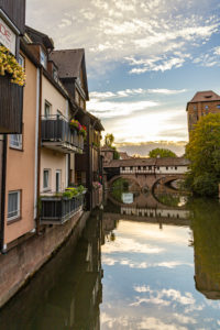 View from Flea Market Bridge to the Pegnitz (river) and the Henker's Bridge in the evening light, Nuremberg city center, Franconia, Bavaria, Germany View from Flea Market Bridge to the Pegnitz (river) and the Henker's Bridge in the evening light, Nuremberg city center, Franconia, Bavaria, Germany
