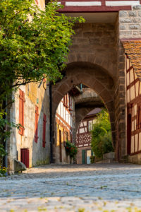 Entrance to the courtyard of Cadolzburg Castle in the late afternoon, Cadolzburg, Franconia, Bavaria, Germany Entrance to the courtyard of Cadolzburg Castle in the late afternoon, Cadolzburg, Franconia, Bavaria, Germany