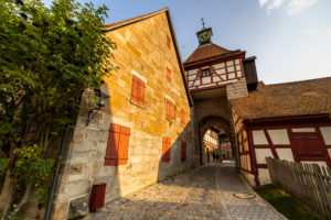 Entrance to the courtyard of Cadolzburg Castle in the late afternoon, Cadolzburg, Franconia, Bavaria, Germany Entrance to the courtyard of Cadolzburg Castle in the late afternoon, Cadolzburg, Franconia, Bavaria, Germany
