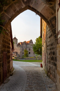 Entrance to the courtyard of Cadolzburg Castle in the evening light, Cadolzburg, Franconia, Bavaria, Germany Entrance to the courtyard of Cadolzburg Castle in the evening light, Cadolzburg, Franconia, Bavaria, Germany