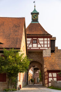 Entrance to the courtyard of Cadolzburg Castle in the late afternoon, Cadolzburg, Franconia, Bavaria, Germany Entrance to the courtyard of Cadolzburg Castle in the late afternoon, Cadolzburg, Franconia, Bavaria, Germany