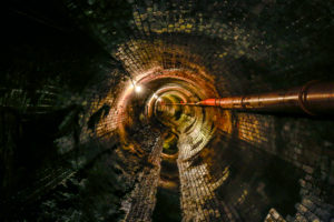 Ruhr area, North Rhine-Westphalia, Germany, topic of sewer network transmission, inspection of an old, brick-built sewer in need of rehabilitation. Ruhr area, North Rhine-Westphalia, Germany, topic of sewer network transmission, inspection of an old, brick-built sewer in need of rehabilitation.