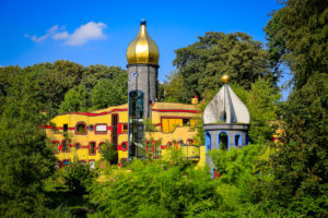 Essen, North Rhine-Westphalia, Ruhr Area, Germany, Grugapark, park area of the Federal Horticultural Show 1965, Ronald McDonald House Essen, the Hundertwasser House in Grugapark on the occasion of the Essen 2017 Green Capital of Europe. Essen, North Rhine-Westphalia, Ruhr Area, Germany, Grugapark, park area of the Federal Horticultural Show 1965, Ronald McDonald House Essen, the Hundertwasser House in Grugapark on the occasion of the Essen 2017 Green Capital of Europe.